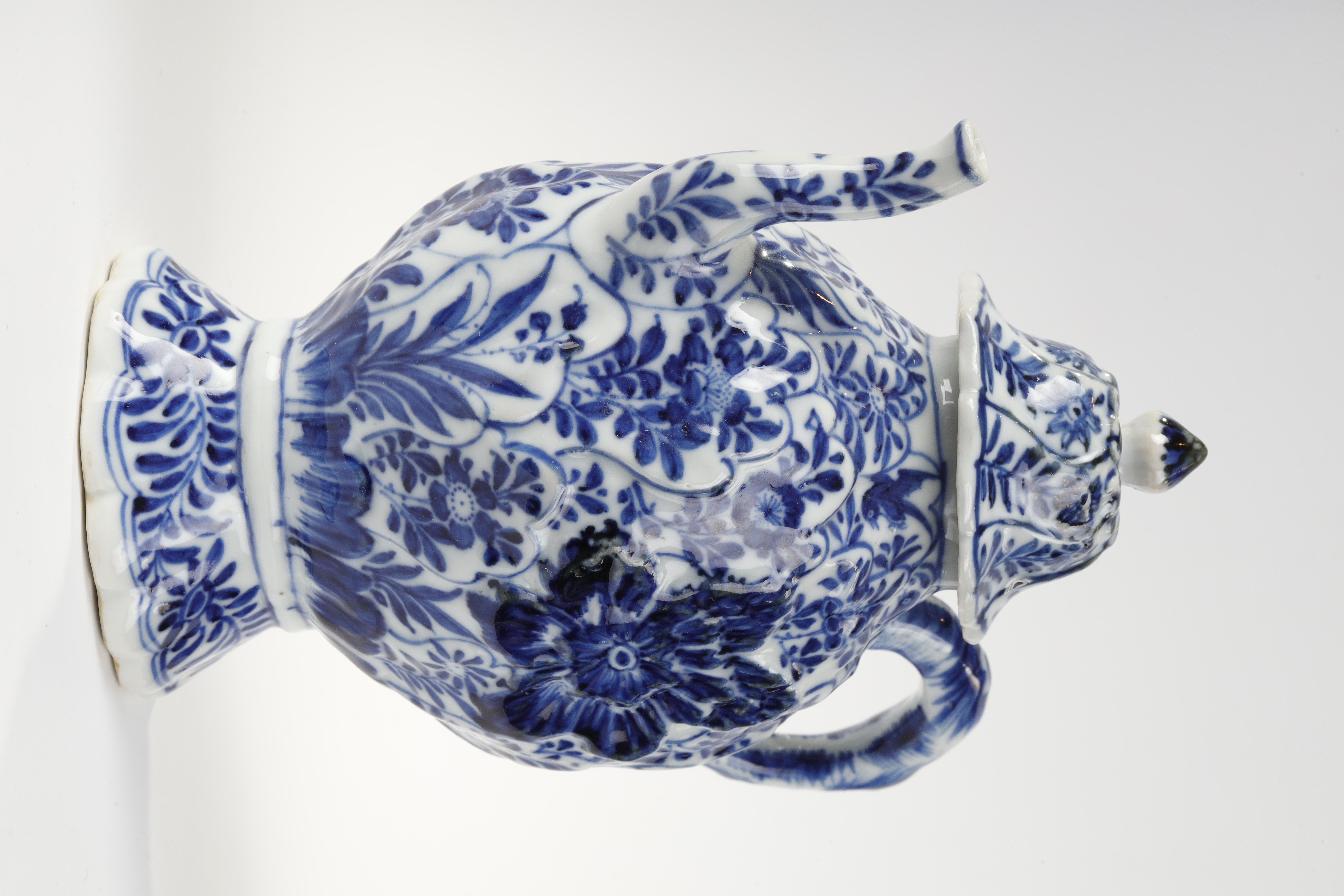 Blue White : Rare blue white porcelain molded with flowers foliage and birds  . The handle shaped branch
China Kangxi Period 1662/1722