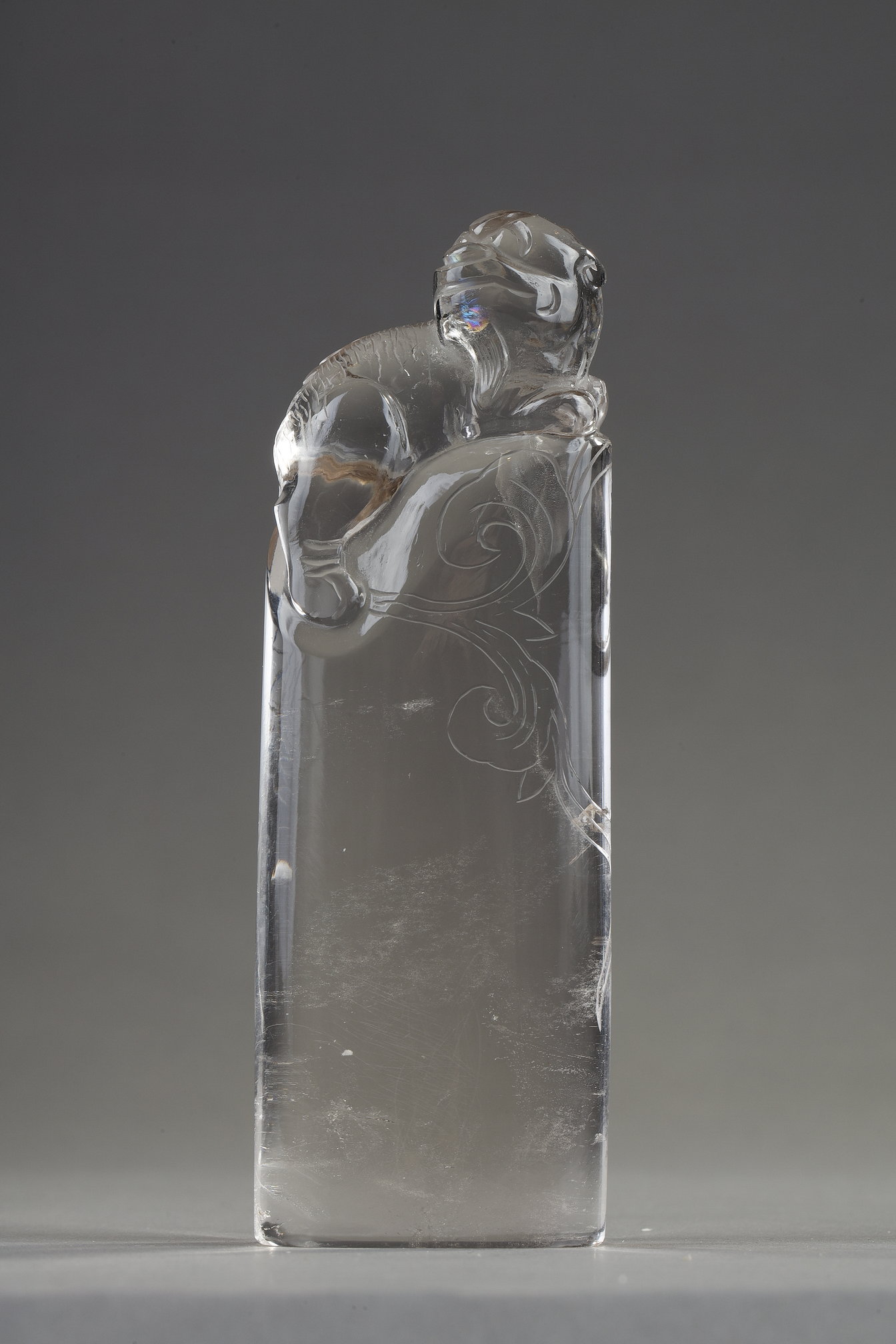 Works of Art :  Pure rock crystal seal surmounted by a carved fo dog. China 19th century