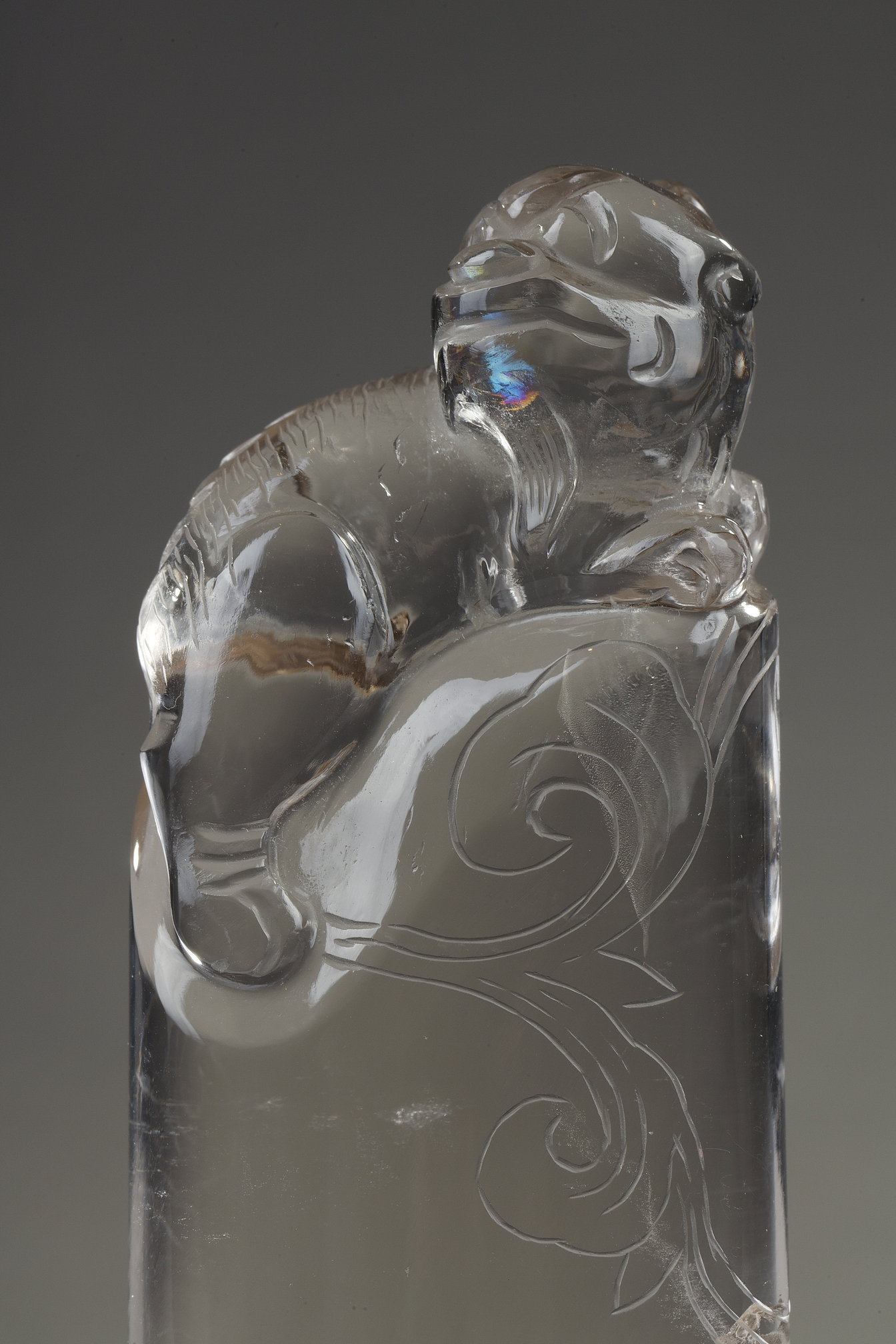 Works of Art :  Pure rock crystal seal surmounted by a carved fo dog. China 19th century