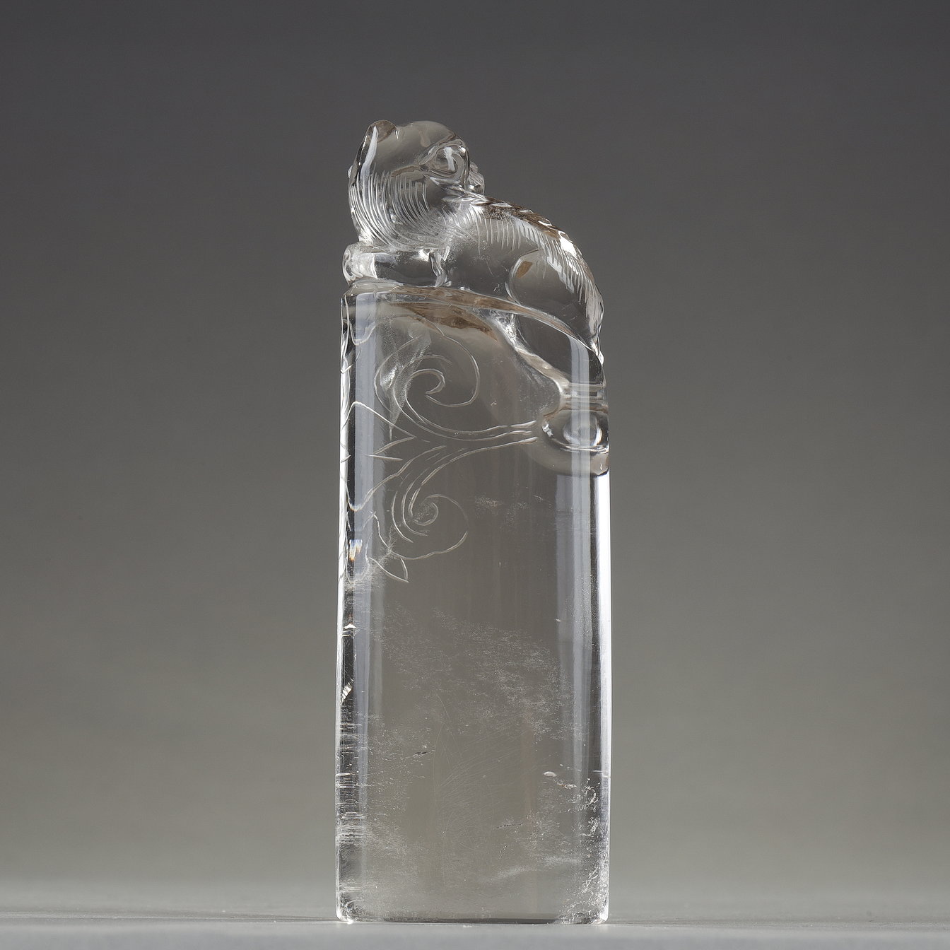 Works of Art :  Pure rock crystal seal surmounted by a carved fo dog. China 19th century