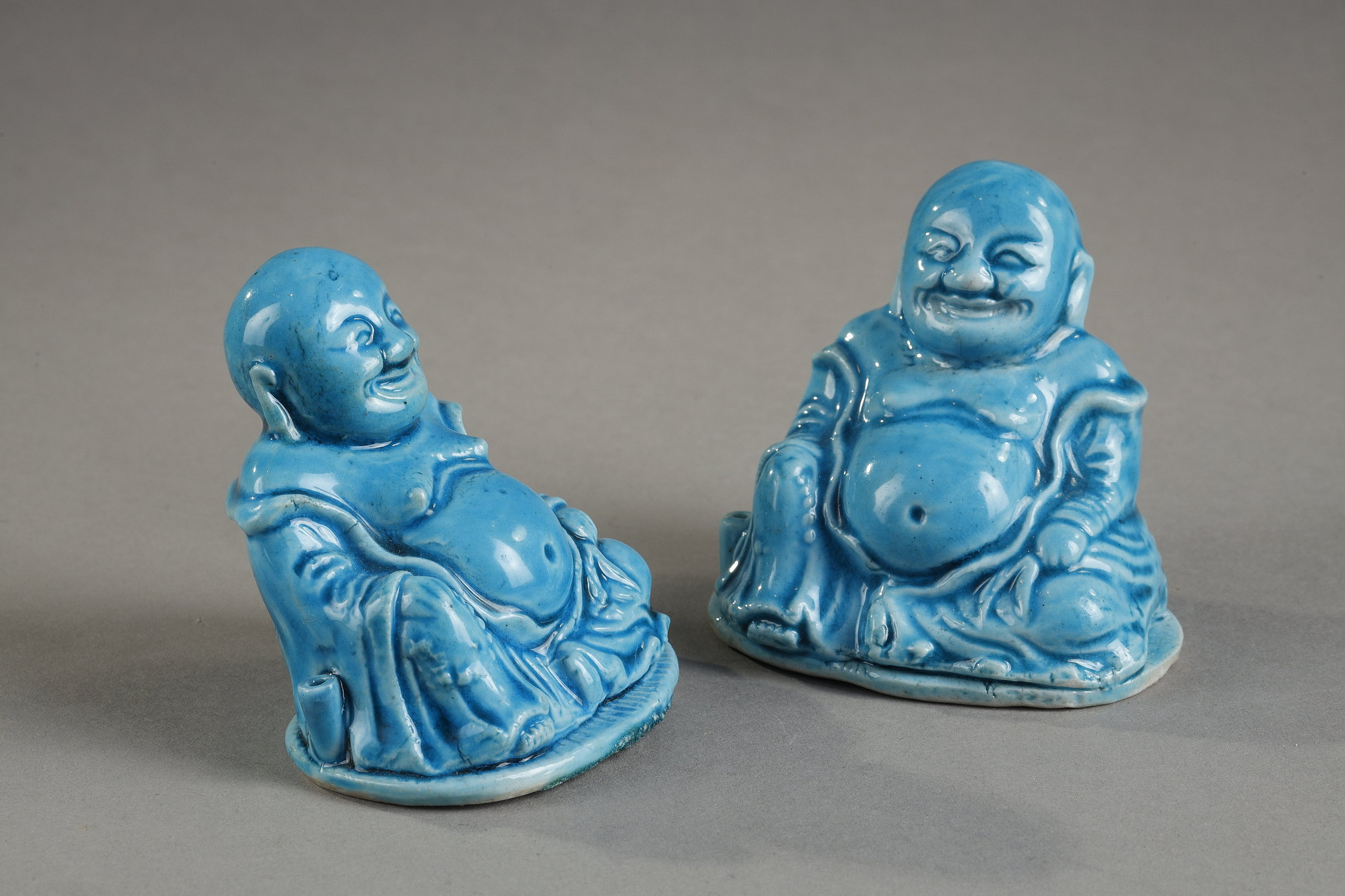 Blue White : Chinese turquoise biscuit pair of Budaisor laughing buddhas forming incense stick holder -
Kangxi period 1662/1722  
H 7,5cm
