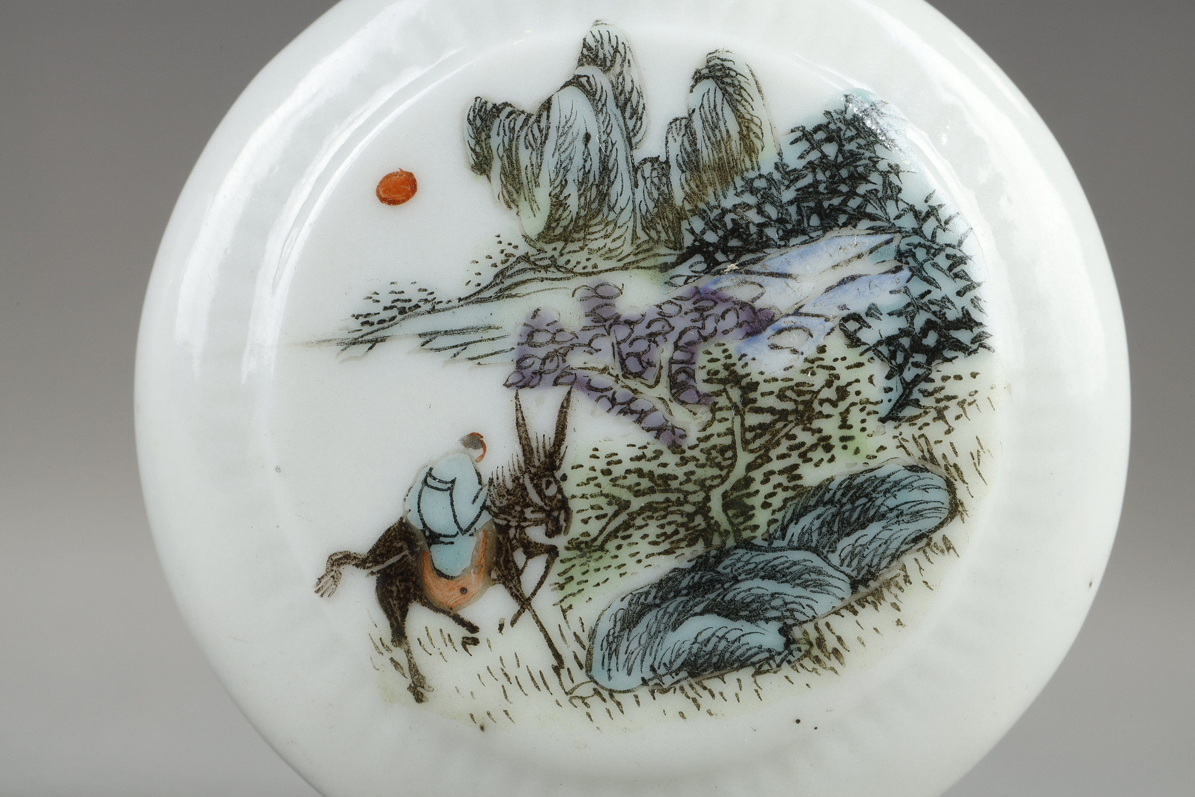 Snuff Bottles : two porcelain snuff bottles in the form of watches painted in polychrome landscapes in the style of traditional Chinese painting. China 19th century