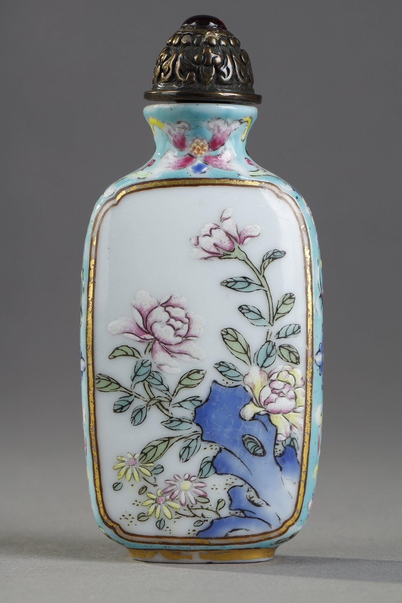 Snuff Bottles : Porcelain snuff bottle finely painted  with flowers and rock on a side  other side
with a poem of emperor Qianlong  - Imperial mark period Qianlong 1736/1795 