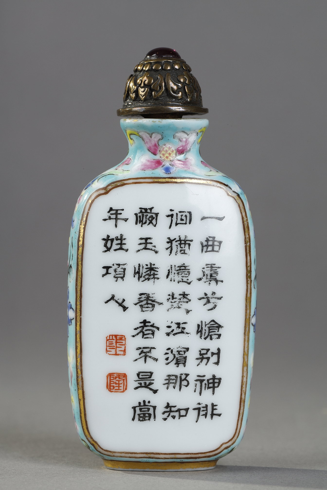 Snuff Bottles : Porcelain snuff bottle finely painted  with flowers and rock on a side  other side
with a poem of emperor Qianlong  - Imperial mark period Qianlong 1736/1795 