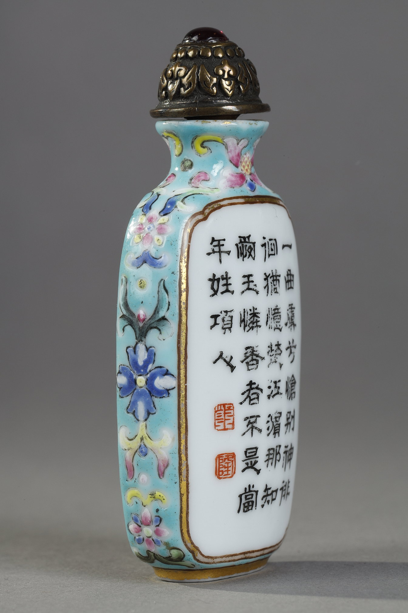Snuff Bottles : Porcelain snuff bottle finely painted  with flowers and rock on a side  other side
with a poem of emperor Qianlong  - Imperial mark period Qianlong 1736/1795 