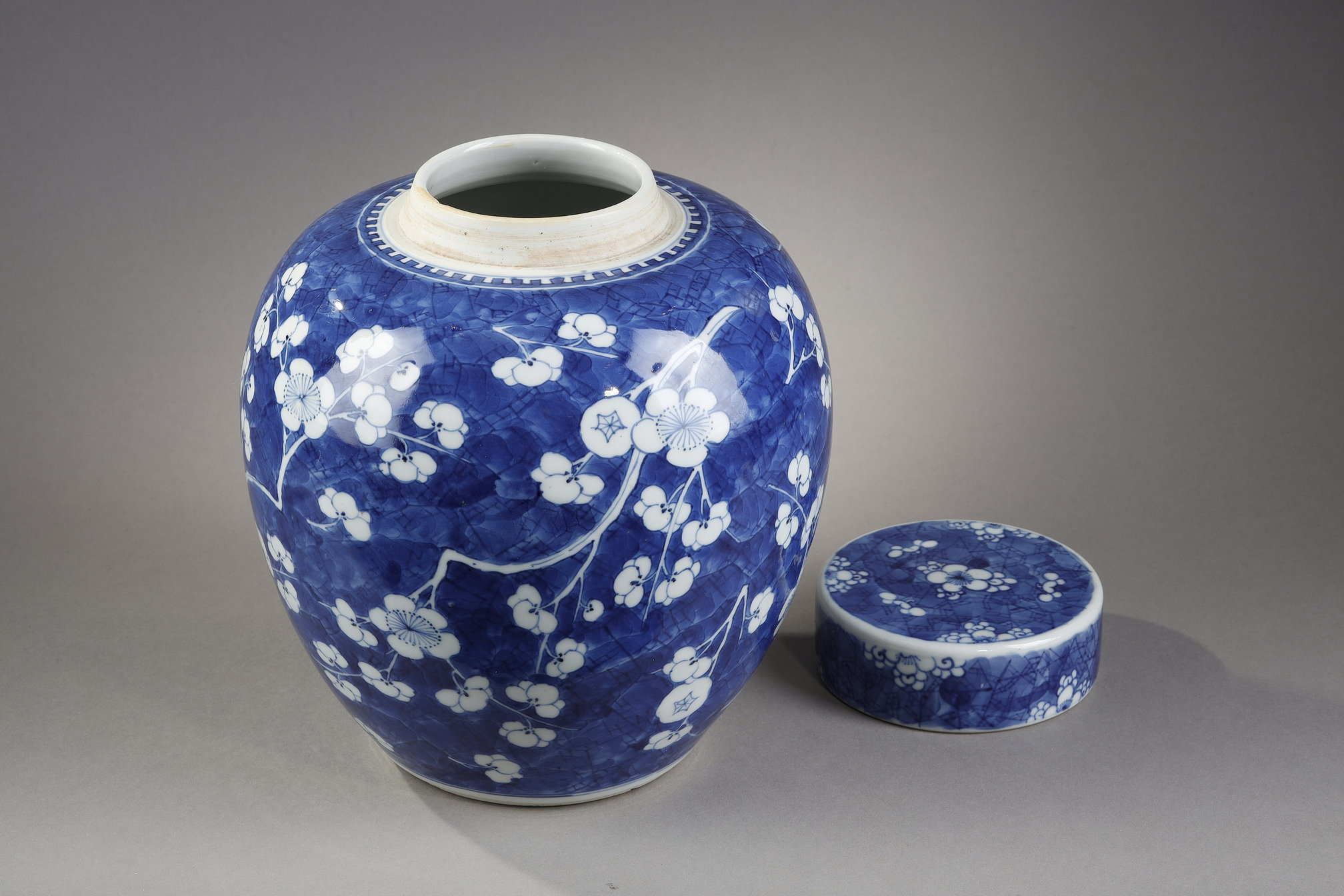 Blue White : Ginger pot and its "blue-white" porcelain cover decorated with prunus branches in flowers on a blue background called "cracked ice"   China Kangxi period 1662/1722