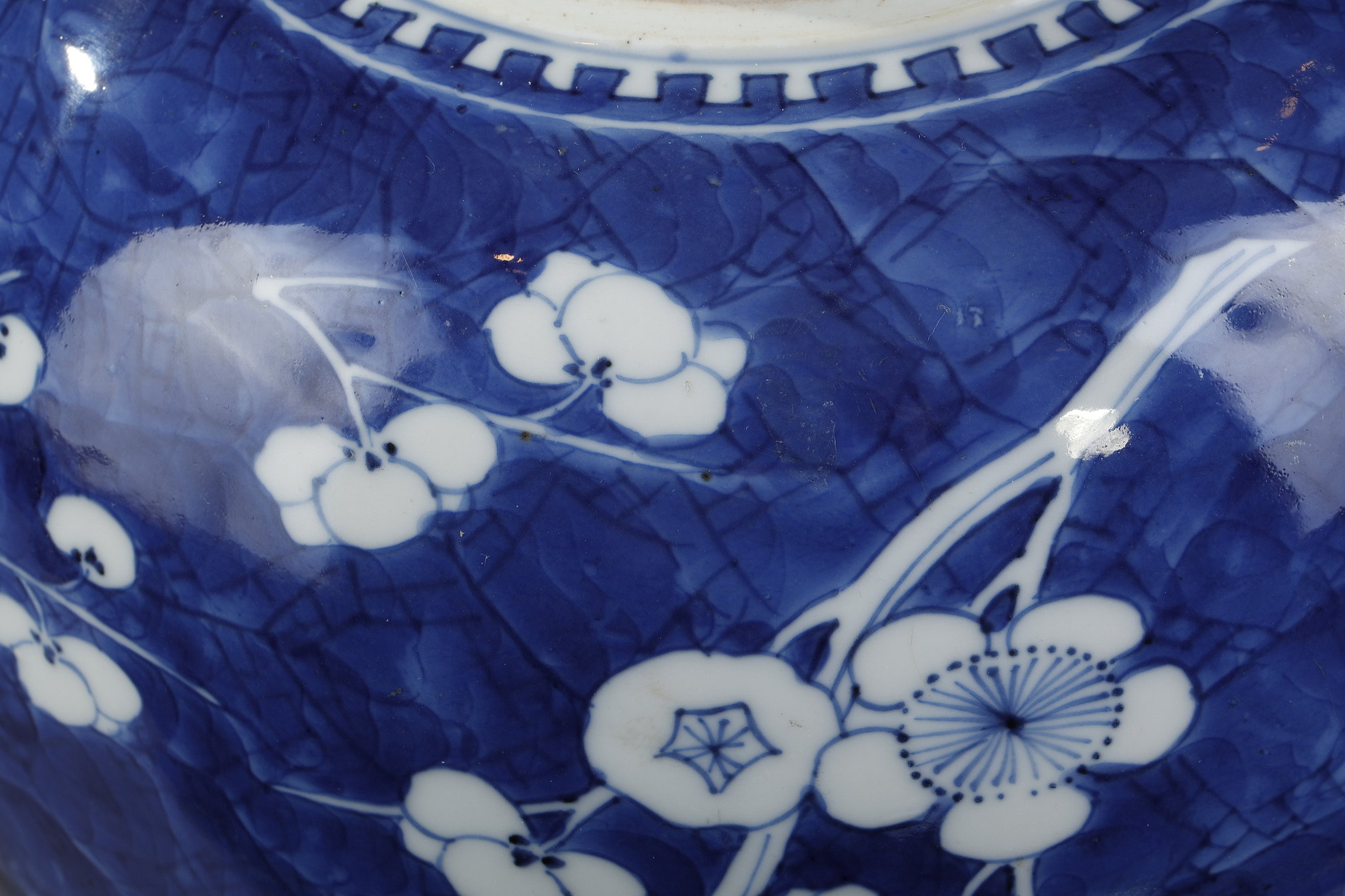 Blue White : Ginger pot and its "blue-white" porcelain cover decorated with prunus branches in flowers on a blue background called "cracked ice"   China Kangxi period 1662/1722