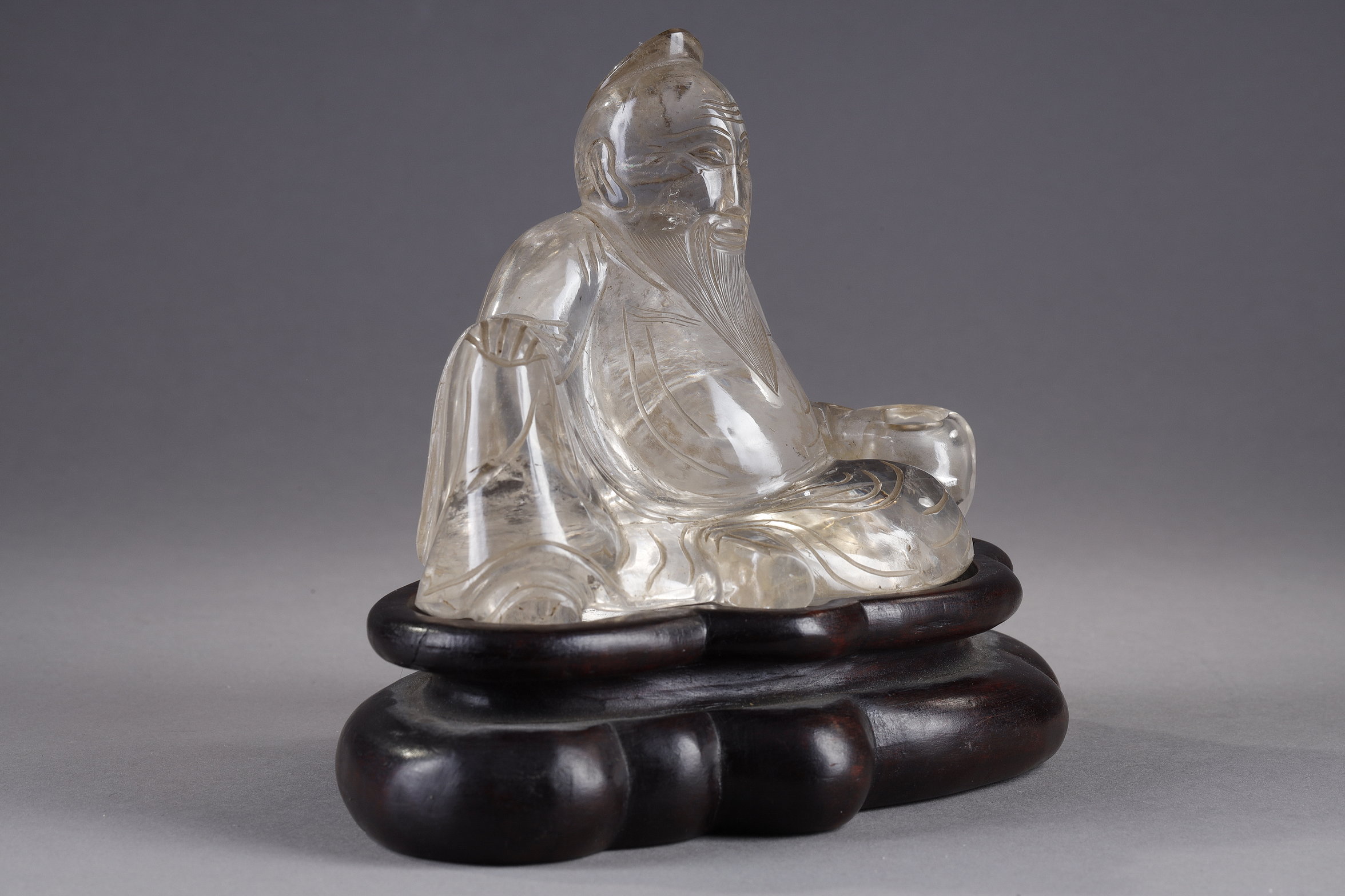 Works of Art : Rock crystal figure probably representing li taipo the famous poet who fell asleep on his jar. China 19th century 