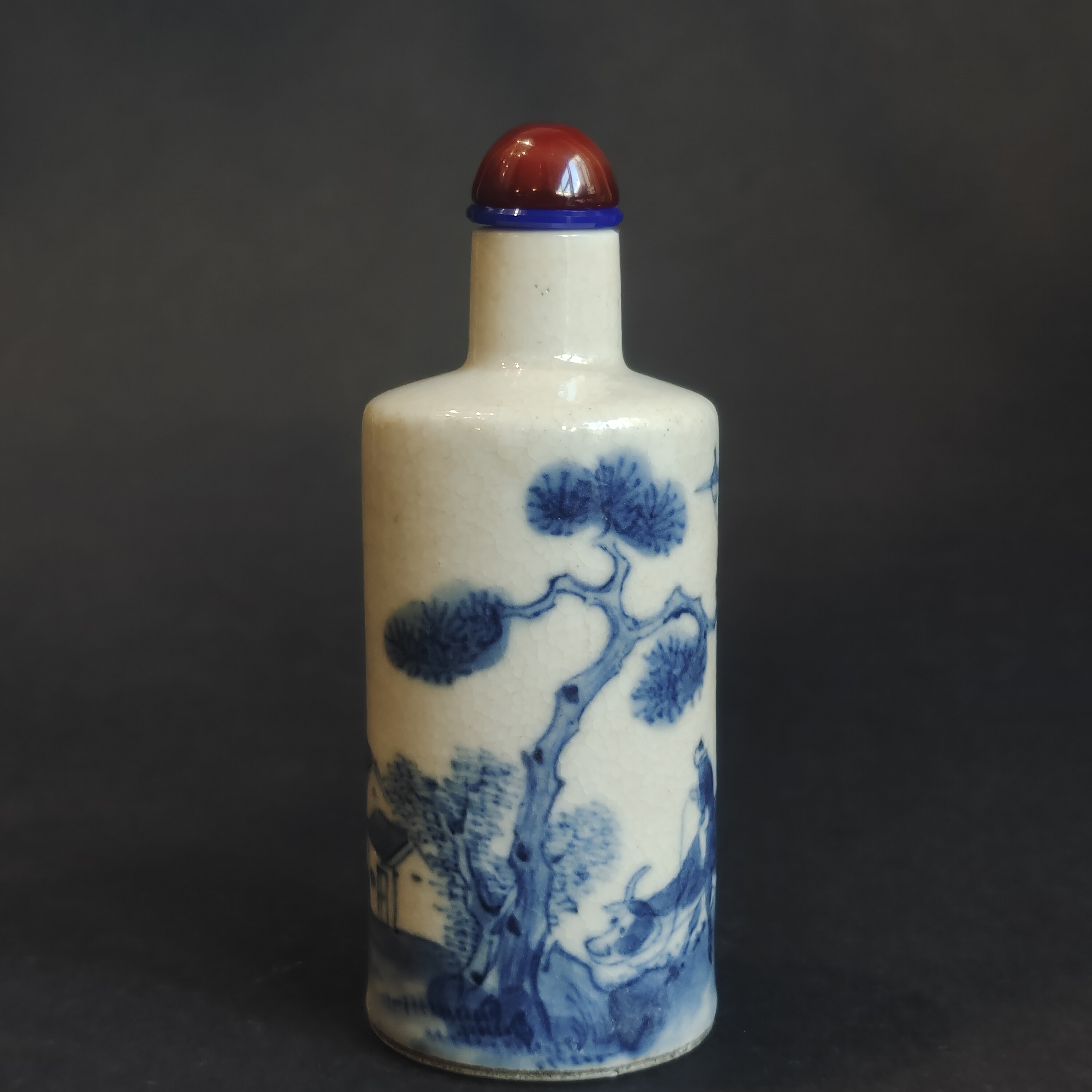 Snuff Bottles : Porcelain snuffbottle soft past decorated in under blue with a child and a buffalo 
China 1st part of the 19th century mark Xuande
H 7,3cm