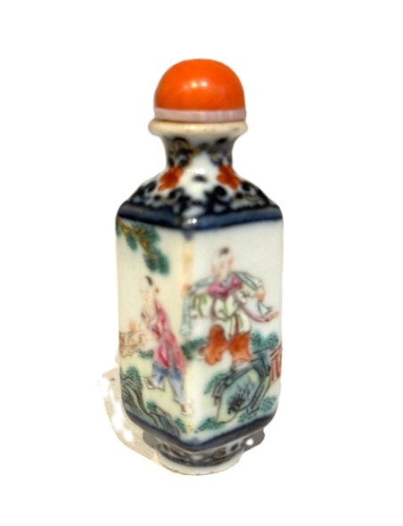 Snuff Bottles : Porcelain quadrangular snuff bottle with a child on each side - China mark and period Qianlong around 1790