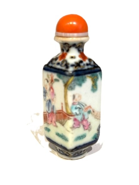 Snuff Bottles : Porcelain quadrangular snuff bottle with a child on each side - China mark and period Qianlong around 1790